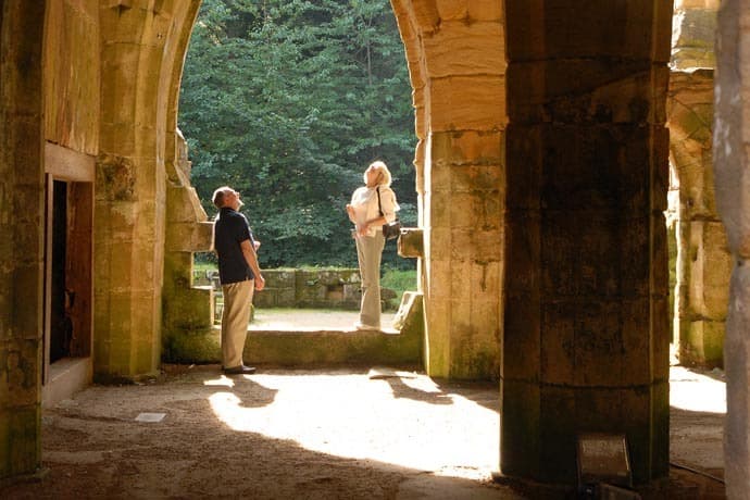 Exploring the Abbey ruins at Fountains Abbey Studley Royal